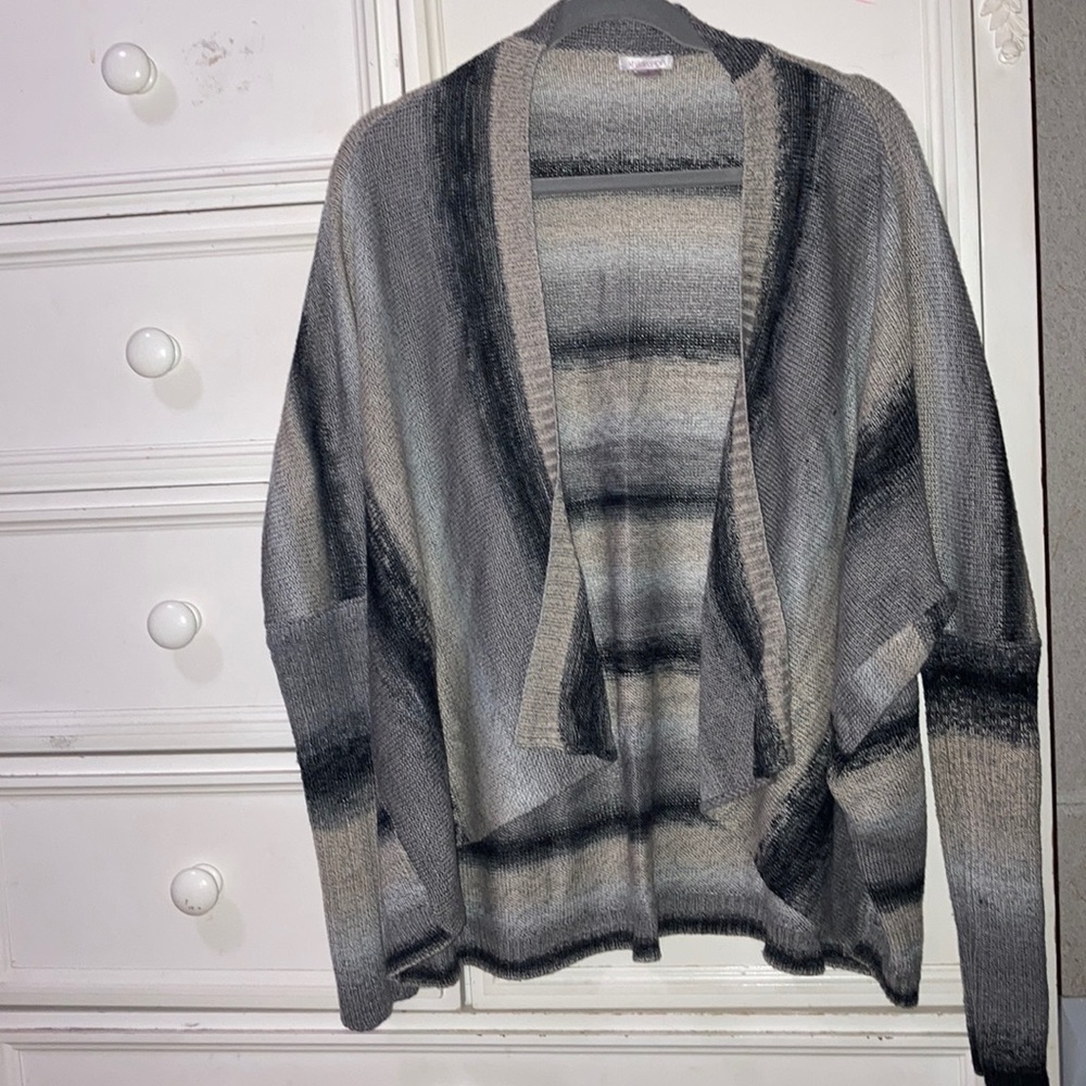 Grey, brown, beige, and black cardigan